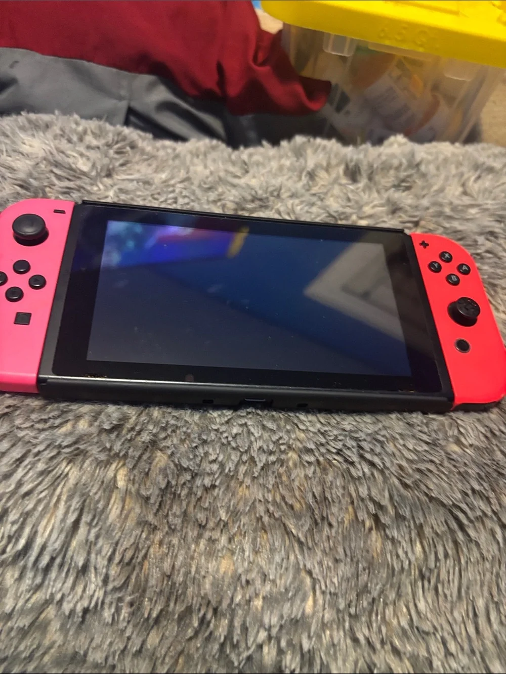 Nintendo Handheld Gaming Console with Pink Joy-Con Controllers